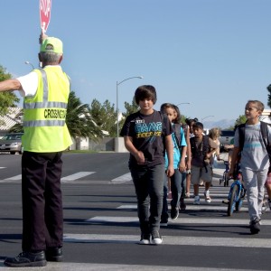 Students safely crossing a street