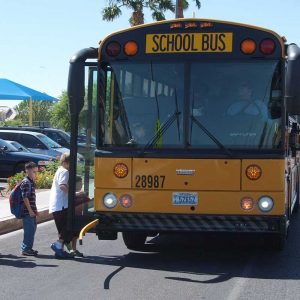 Students get on a bus