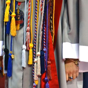 A graduate and their stoles