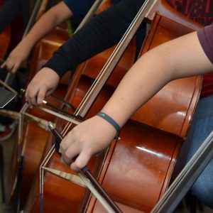 Middle school students in music class