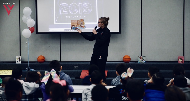 Las Vegas Aces player Carolyn Swords reads to Lynch ES students