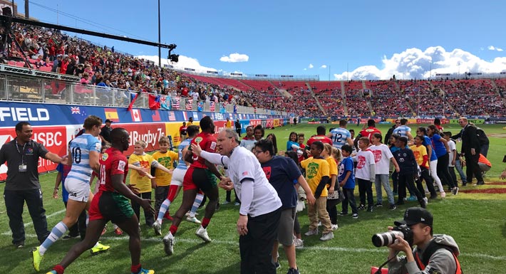 CCSD students greet rugby players on field