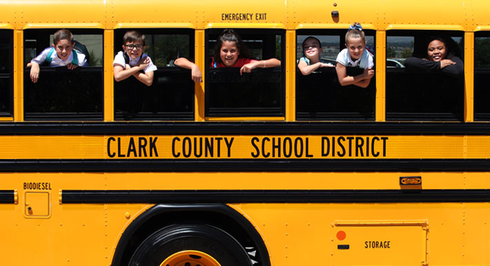 CCSD front page banner; children on a bus