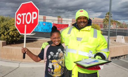 School crossing guard and student.