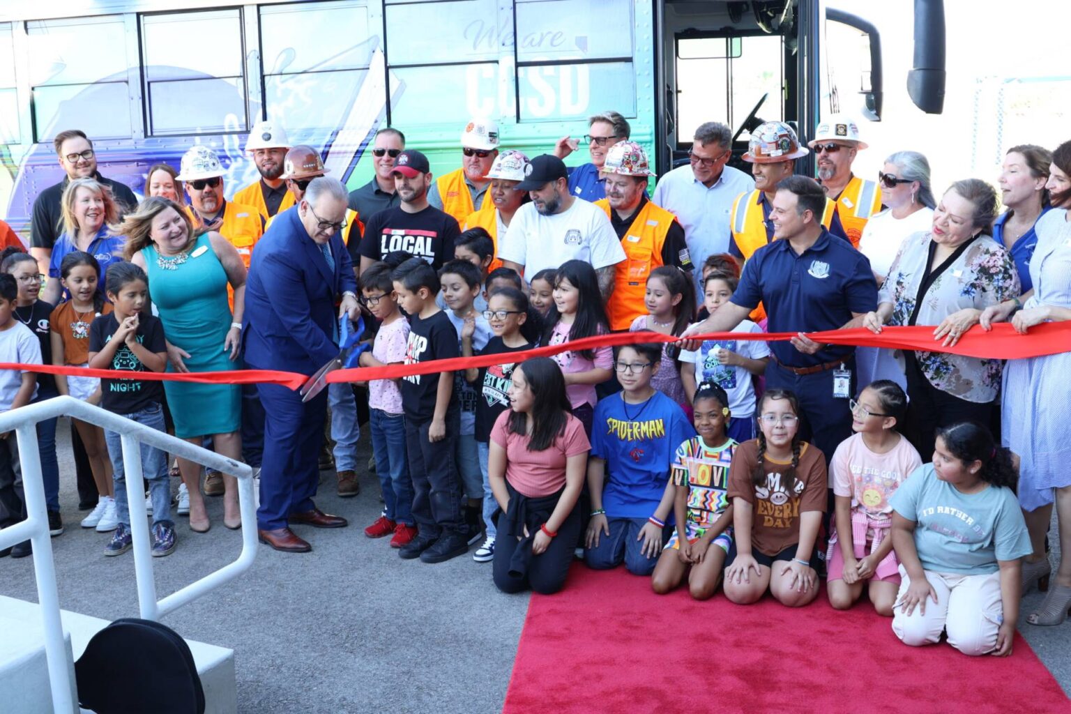 Dr. Jesus Jara celebrates the Book Bus