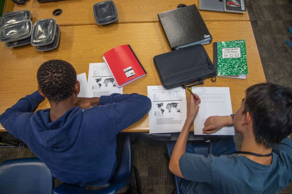 Students studying at a table