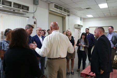 Nevada state lawmakers gather during a tour of CCSD Food Services Facilities to discuss the importance of high quality school meals.