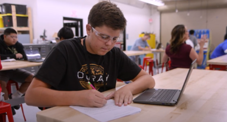 Sierra Vista HS CTE Student Writing with Laptop