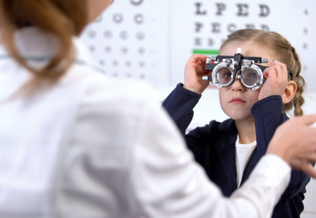 Student getting eye exam.