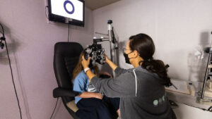 aCCSD student receiving and eye exam