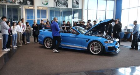 Gaudin Technical Institute at Gaudin Ford show students from Spring Valley High School around the showroom.